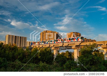 Osaka Monorail Saito Line sunset view wrapping train 108016346
