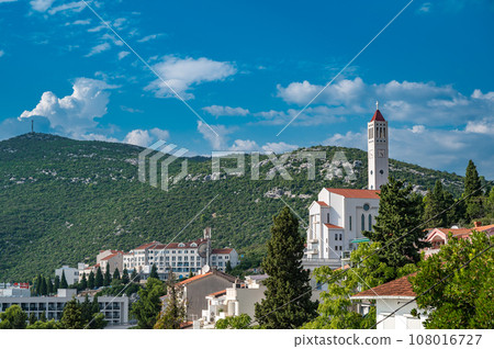 View of Bosnian city of Neum in summer with catholic church Crkva svetog Ivana 108016727