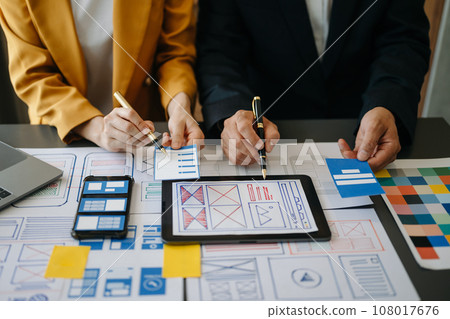 UX graphic designer planning application process development prototype wireframe for web smart phone. Creative digital development agency.. UX graphic designer planning application process development prototype wireframe for web smart phone. Creative digital development agency.. 108017676