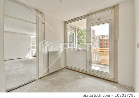 an empty room that is being renovated and ready to be used for new construction or reurrectionment 108017793