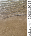 Sandy beach and waves 108018015