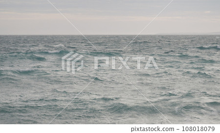 stormy mediterranean sea with cloudy weather and soft light 108018079