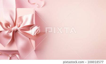 Pink gift box with shining pink ribbon bow on pink background. Gift or holiday concept. 108018577
