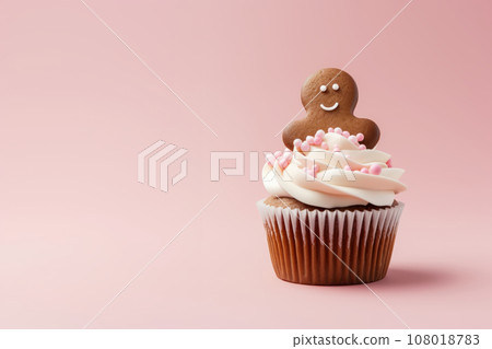 Christmas cupcake with gingerbread man decoration Christmas cupcake with gingerbread man decoration 108018783