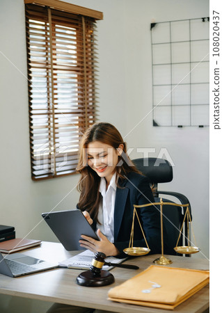 beautiful young asian lawyer woman sitting working in the office.. 108020437