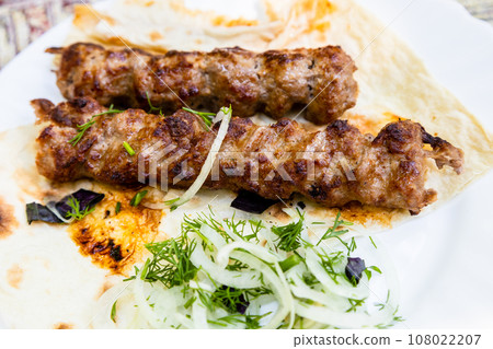 portion of kebabs close up in Armenian village portion of kebabs close up in Armenian village 108022207