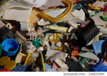 Waste plastic, plastic trash washed up on the beach, microplastics, environmental destruction, environmental issues SDGs Waste plastic, plastic trash washed up on the beach, microplastics, environmental destruction, environmental issues SDGs 108023894