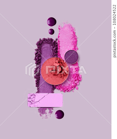 Composition of abstract makeup cosmetics swatches. Variety of eyeshadow and blusher smudged texture. Creative cosmetics samples. 108024522