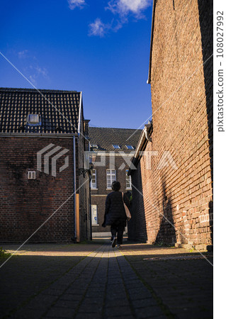 A brick corner of a European town 108027992