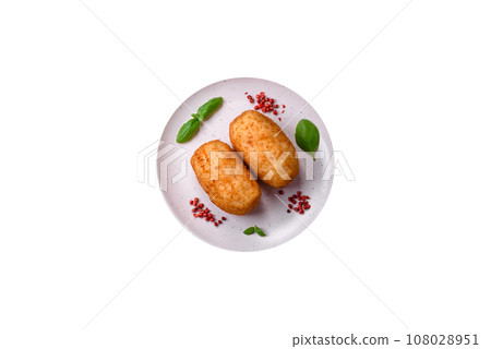 Delicious baked potato cutlet stuffed with chicken and vegetables, spices and salt 108028951