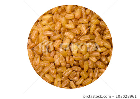 Raw bulgur wheat porridge as an ingredient for preparing a delicious dish 108028961