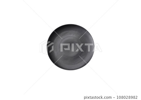 Empty ceramic round plate on dark textured concrete background Empty ceramic round plate on dark textured concrete background 108028982