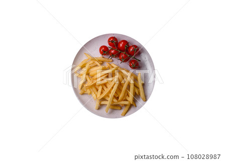Fresh delicious crispy French fries with salt and spices 108028987