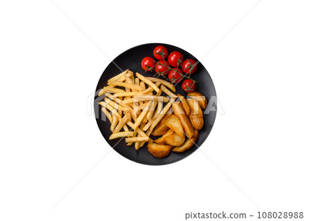 Fresh delicious crispy French fries with salt and spices Fresh delicious crispy French fries with salt and spices 108028988