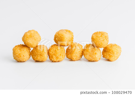 Breaded Chicken Inner Fillet on a White Background,Chicken Breaded Raw Meat.Chicken Breaded Fillet. Breaded chicken nuggets. Fast homemade food at home. Chicken breaded schnitzels. Fast cooking. 108029470
