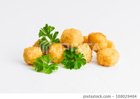 Chicken Breaded Fillet. Breaded chicken nuggets. Fast homemade food at home. Chicken breaded schnitzels. Breaded Chicken Inner Fillet on a White Background,Chicken Breaded Raw Meat. Fast cooking. 108029484