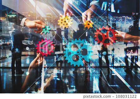 Business team work together and combine pieces of gears. Partnership and integration concept Business team work together and combine pieces of gears. Partnership and integration concept 108031122