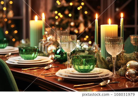 Christmas table setting with candles and green festive tableware for Christmas celebration Christmas table setting with candles and green festive tableware for Christmas celebration 108031979