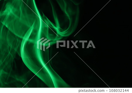 Green smoke on a dark background, colourful abstract, green fog, minimalistic background Green smoke on a dark background, colourful abstract, green fog, minimalistic background 108032144