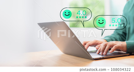Customer use a laptop in give rating to service experience assessment on application to shop. Client satisfaction survey concept, 4 and 5 star satisfaction, testimonial feedback review, good service. Customer use a laptop in give rating to service experience assessment on application to shop. Client satisfaction survey concept, 4 and 5 star satisfaction, testimonial feedback review, good service. 108034322