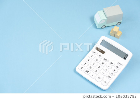 Trucks and calculators, delivery, delivery, home delivery, moving, transportation industry Trucks and calculators, delivery, delivery, home delivery, moving, transportation industry 108035782