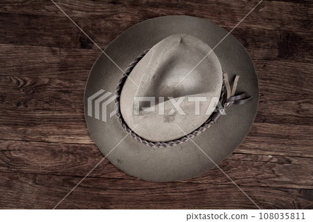 Old west hat on table. Old west hat on table. 108035811