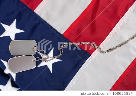 US army dog tags on USA national flag 108035834