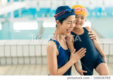 Kids swimming 108036769