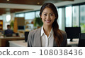 Young Asian happy Business in office. Stylish manager smiling woman executive manager, secretary offering professional business service sitting at office desk together with colleagues. AI generate 108038436