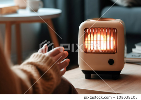 用電爐暖手的“AI生成圖像” 用電爐暖手的“AI生成圖像” 108039105