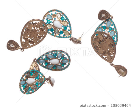 Fashion pearl Earrings with beautiful work detail is value. Luxury deep sea pearl diamond earring is fashion trend and fly in air. White background isolated 108039464