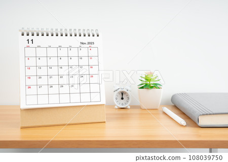 November 2023, Monthly desk calendar for 2023 year on wooden table. November 2023, Monthly desk calendar for 2023 year on wooden table. 108039750