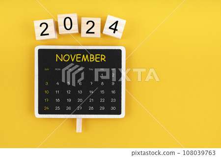 Calendar for November 2024 in black chalkboard with copy space. 108039763
