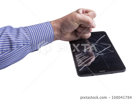 a broken tablet with a punch a broken tablet with a punch 108041784
