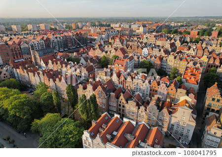 Beautiful panoramic architecture of old town in Gdansk, Poland at sunrise. Aerial view drone pov. Landscape cityscape City from Above. Small vintage historical buildings Europe Tourist Attractions 108041795