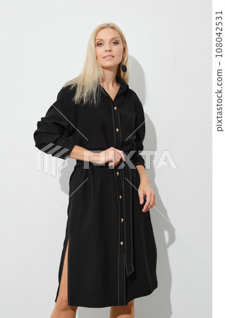 Trendy woman in black jeans dress 108042531