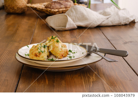 Meat cutlets baked in oven on a plate Meat cutlets baked in oven on a plate 108043979