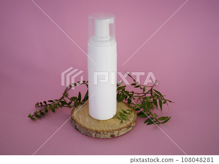 Empty white packaging tube for beauty spa, medical skin care and cosmetic lotion cream packaging, face wash foam, product design layout on pink background Empty white packaging tube for beauty spa, medical skin care and cosmetic lotion cream packaging, face wash foam, product design layout on pink background 108048281