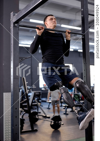 young motivated man building upper body strength 108049924