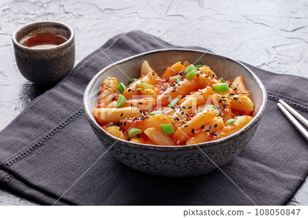 Tteokbokki or topokki, Korean street food, spicy rice cakes 108050847