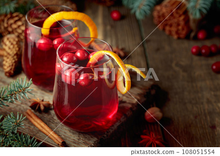 Christmas drink with spices and cranberries. Christmas drink with spices and cranberries. 108051554