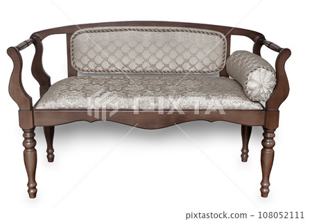 A small wooden sofa in vintage style on a white background. A small wooden sofa in vintage style on a white background. 108052111