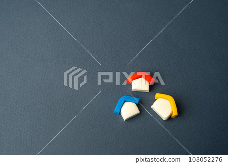 House figures. Realtor services. Find most suitable housing options. Valuation of residential buildings. Buying and selling. Offers on real estate market. Copy space, place for text. 108052276