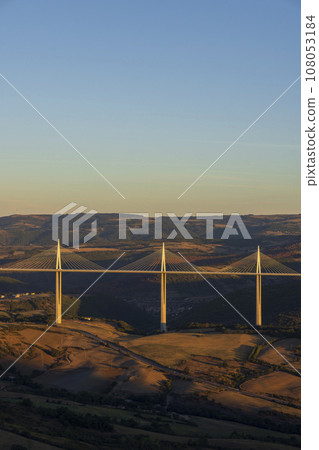 Multi-span cable stayed Millau Viaduct across gorge valley of Tarn River, Aveyron Departement, France Multi-span cable stayed Millau Viaduct across gorge valley of Tarn River, Aveyron Departement, France 108053184