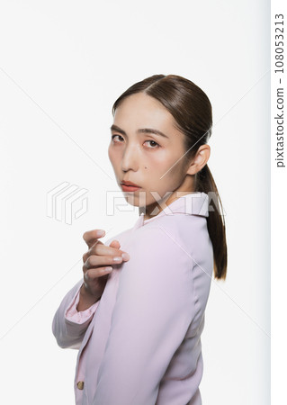 High contrast portrait of a cool woman High contrast portrait of a cool woman 108053213