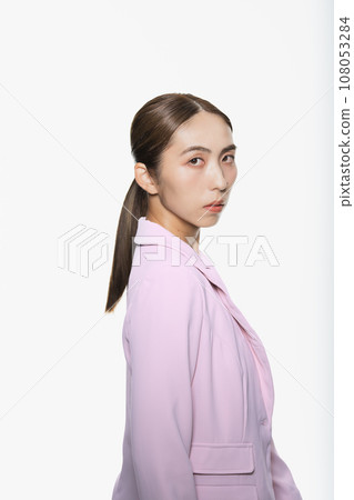 High contrast portrait of a cool woman 108053284