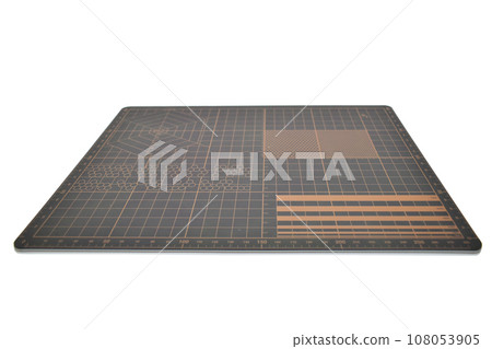 brown cutting mat isolated on white background, equipment in office 108053905