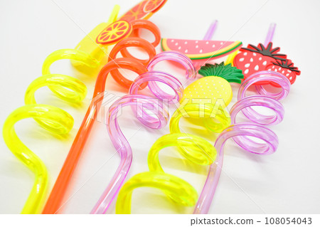 close up colorful fruit drinking staws on white background close up colorful fruit drinking staws on white background 108054043