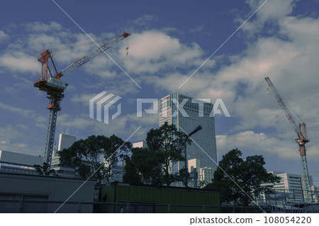 Crane under construction reflected in the sky 108054220