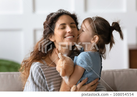 Little girl cuddle show love to young mom 108054554